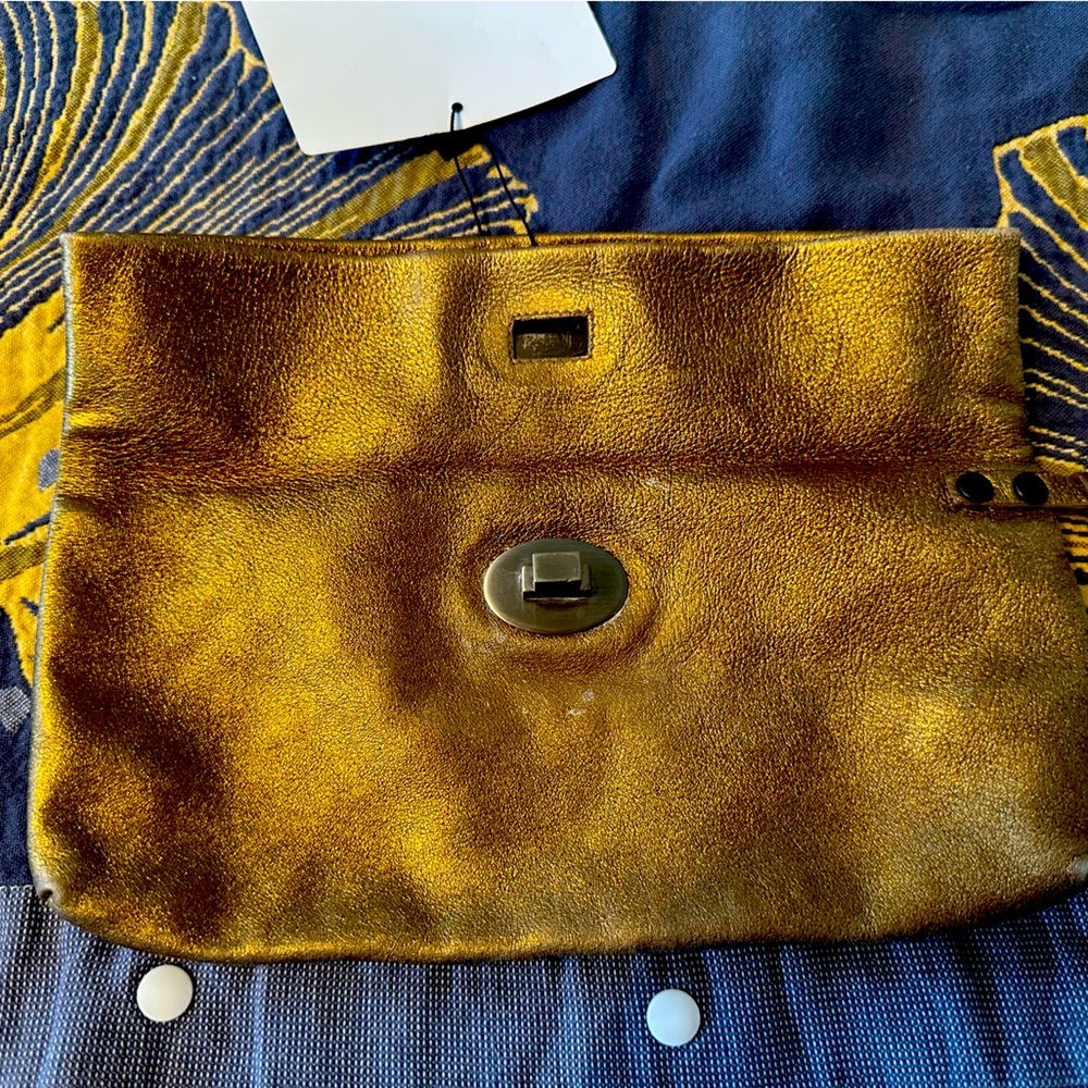MIU MIU bronze leather wristlet.
